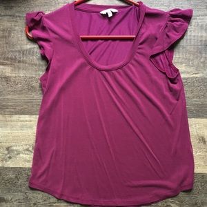 Purple dress shirt with ruffles on the shoulders